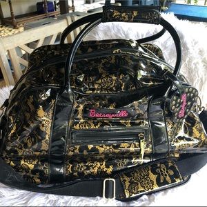 Betseyville rolling duffle